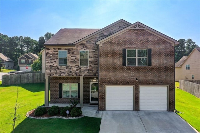 traditional-style house with driveway, a front lawn, fence, and brick siding