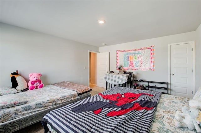 bedroom with carpet flooring and recessed lighting