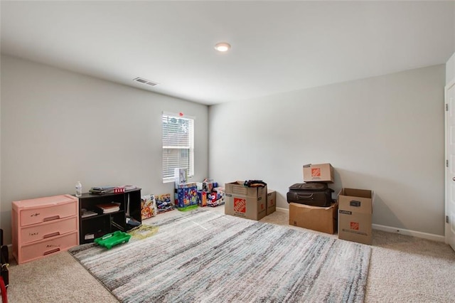 game room with carpet, visible vents, and baseboards