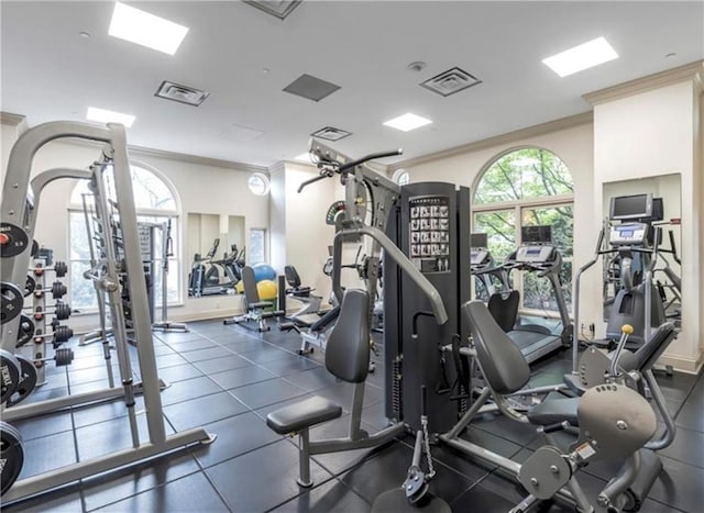 workout area with crown molding