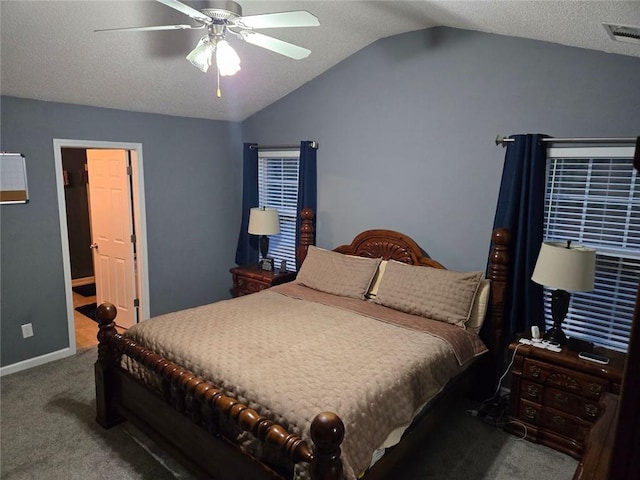 carpeted bedroom featuring lofted ceiling, a textured ceiling, and ceiling fan