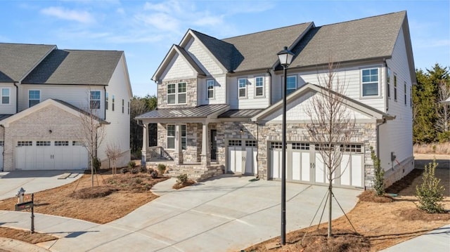 view of front of home with a garage and covered porch