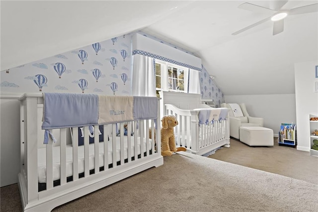 bedroom featuring vaulted ceiling, ceiling fan, carpet flooring, and wallpapered walls