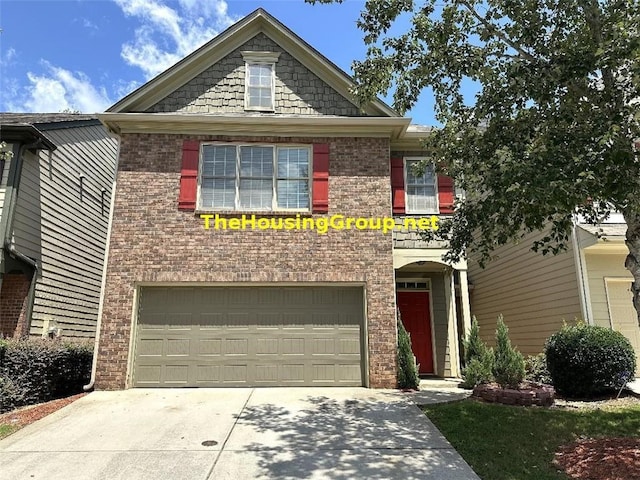 view of front of property featuring a garage