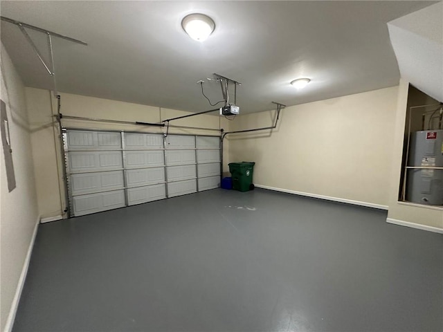 garage featuring a garage door opener and water heater