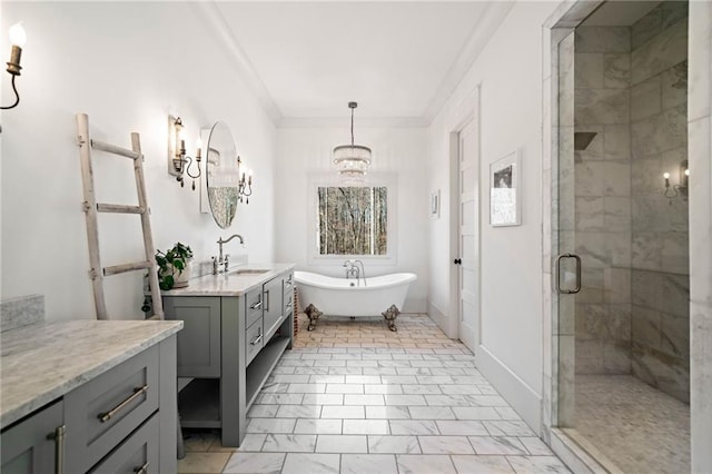 bathroom featuring a shower stall, marble finish floor, a freestanding bath, vanity, and a chandelier