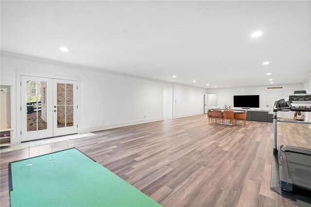 office space with an AC wall unit, french doors, dark wood-style floors, and recessed lighting