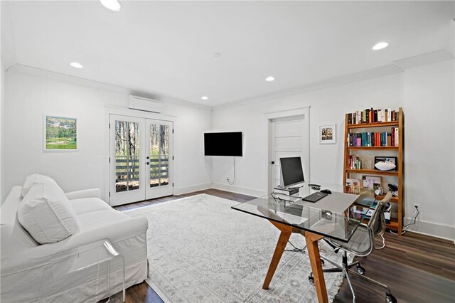 living area with baseboards, wood finished floors, recessed lighting, and a wall unit AC