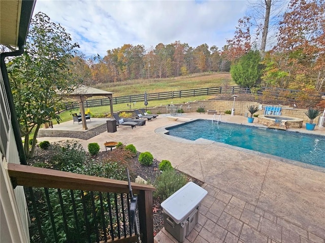 view of pool featuring a gazebo, a jacuzzi, and a patio