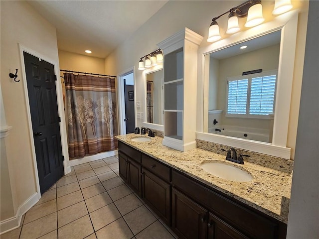 bathroom featuring vanity, separate shower and tub, and tile patterned floors