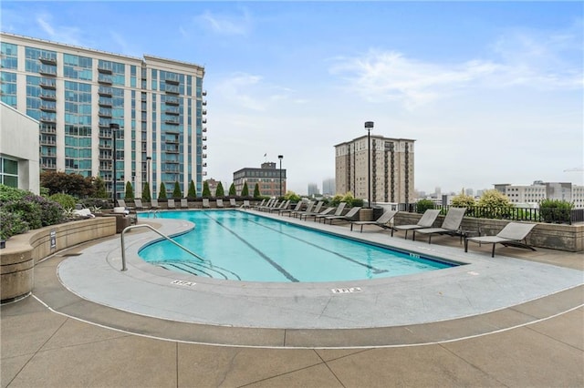 view of swimming pool featuring a patio