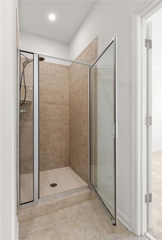 90 Grove Park Ln, Woodstock, GA 30189 - bathroom featuring a stall shower, tile patterned floors, and recessed lighting