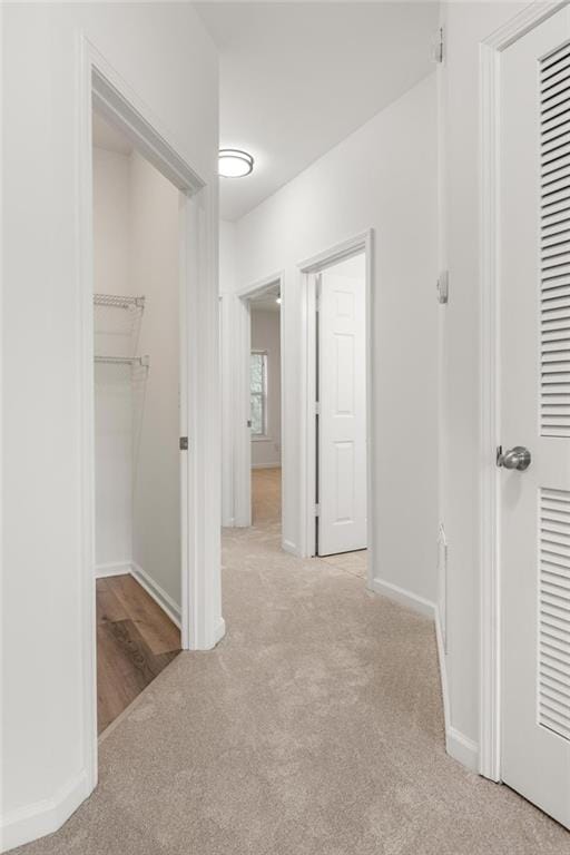 90 Grove Park Ln, Woodstock, GA 30189 - hallway with carpet and baseboards