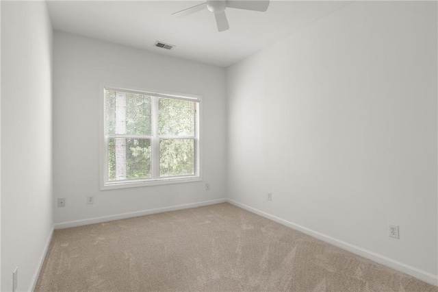 90 Grove Park Ln, Woodstock, GA 30189 - carpeted spare room featuring healthy amount of natural light, a ceiling fan, and baseboards