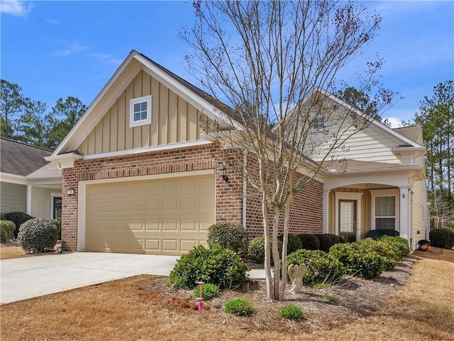 view of front of property with a garage, brick siding, board and batten siding, and driveway