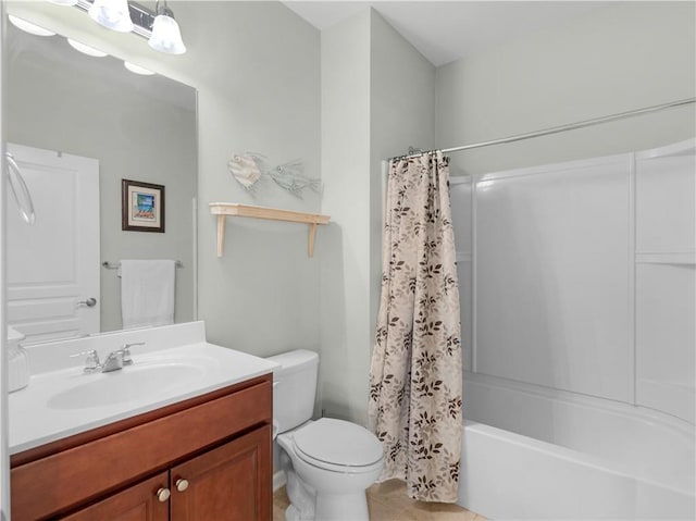 full bathroom with tile patterned floors, toilet, vanity, and shower / tub combo