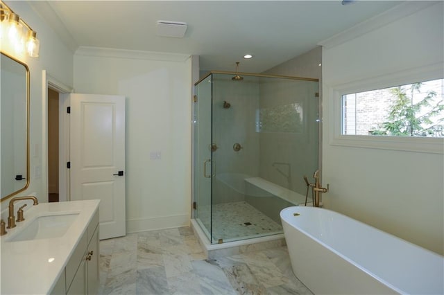 bathroom with ornamental molding, vanity, and separate shower and tub