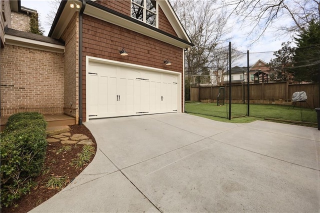 garage with a lawn