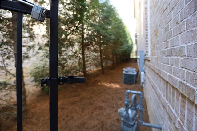 view of side of home featuring central air condition unit