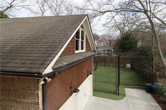 view of property exterior featuring a yard