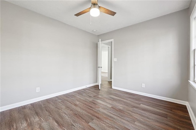 empty room featuring ceiling fan and wood-type flooring