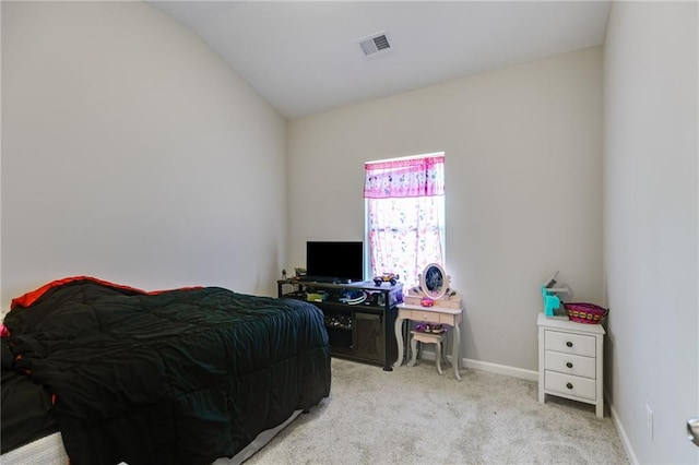 119 Sourwood Ln, Temple, GA 30179 - bedroom featuring baseboards, visible vents, light carpet, and vaulted ceiling