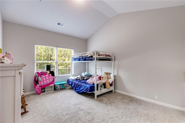 119 Sourwood Ln, Temple, GA 30179 - carpeted bedroom with baseboards, visible vents, and lofted ceiling