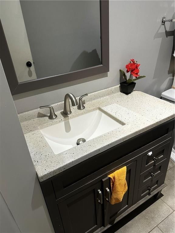 bathroom with vanity and tile patterned floors