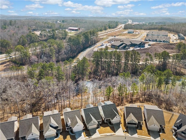 aerial view with a residential view and a forest view