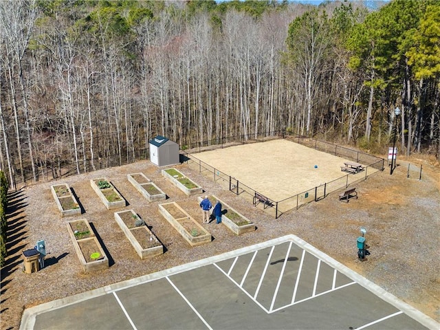 aerial view featuring a wooded view