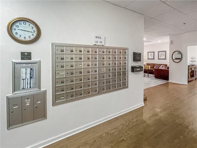 475 Mount Vernon Hwy NE Unit C230, Sandy Springs, GA 30328 - detailed view of mail area, a paneled ceiling, and wood finished floors
