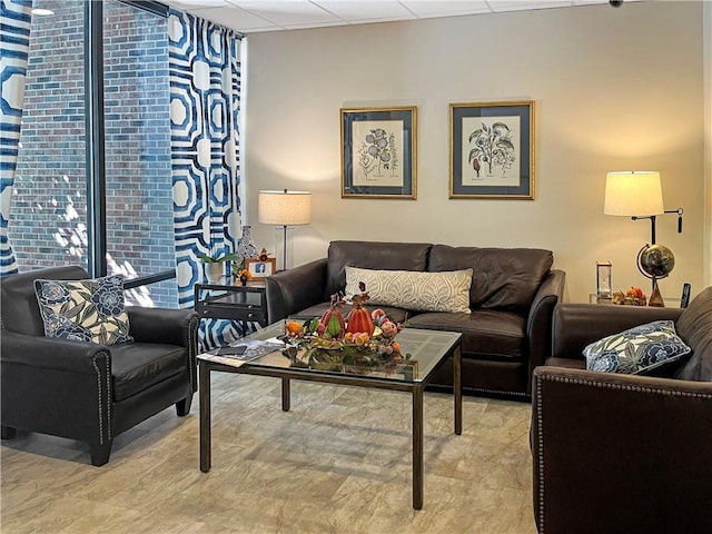 475 Mount Vernon Hwy NE Unit C230, Sandy Springs, GA 30328 - living room with expansive windows and a paneled ceiling