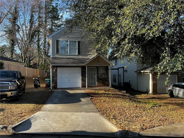 3523 Lehigh Way, Decatur, GA 30034 - traditional home featuring concrete driveway, brick siding, and fence