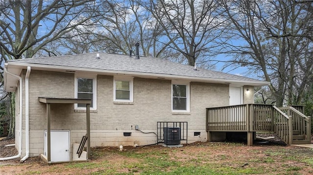 back of property featuring a deck and central air condition unit