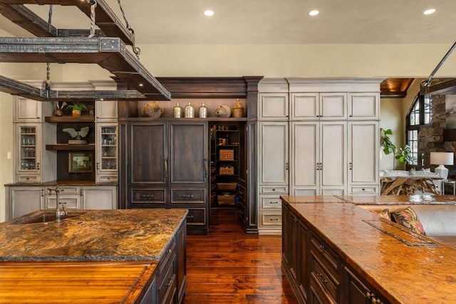 kitchen with recessed lighting, open shelves, and dark wood-type flooring