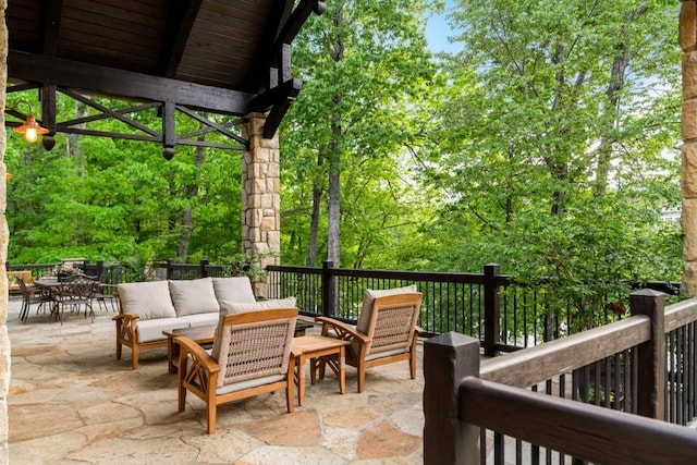 view of patio / terrace featuring an outdoor hangout area and outdoor dining space