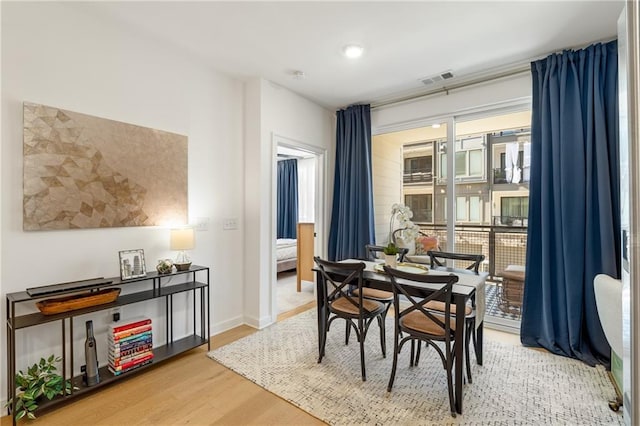 383 Pratt Dr SE Unit 503, Atlanta, GA 30315 - dining room featuring wood finished floors and baseboards