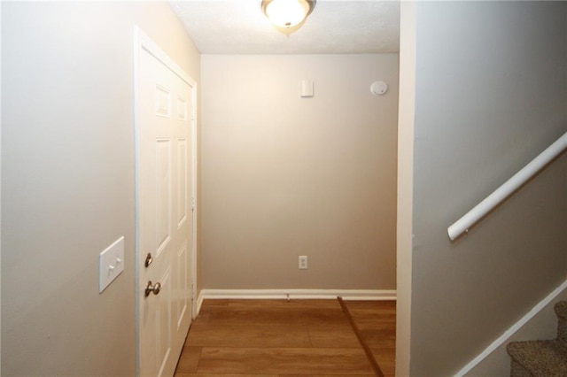 unfurnished room with plenty of natural light, ceiling fan, and hardwood / wood-style floors