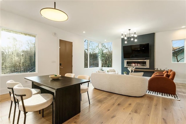 1045 Shepherds Ln NE, Atlanta, GA 30324 - dining space with recessed lighting, baseboards, light wood-style floors, and a chandelier