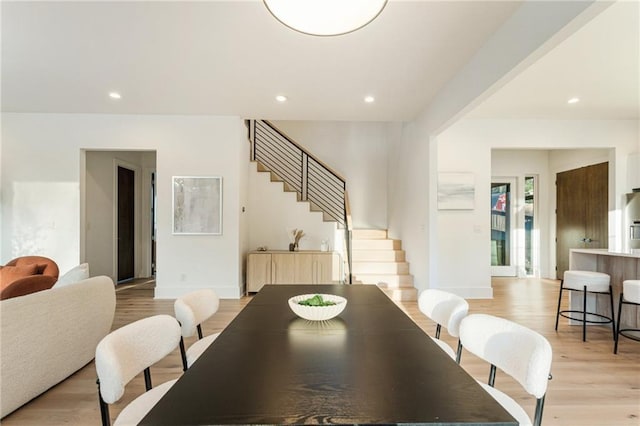 1045 Shepherds Ln NE, Atlanta, GA 30324 - dining space featuring stairs, recessed lighting, and light wood finished floors