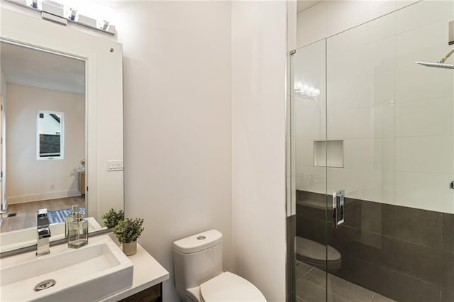 1045 Shepherds Ln NE, Atlanta, GA 30324 - bathroom with vanity, toilet, and a stall shower