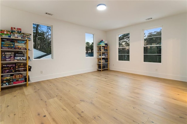 1045 Shepherds Ln NE, Atlanta, GA 30324 - spare room with visible vents, baseboards, and light wood-style floors
