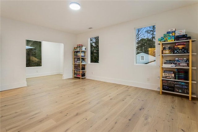 1045 Shepherds Ln NE, Atlanta, GA 30324 - empty room featuring baseboards and wood-type flooring