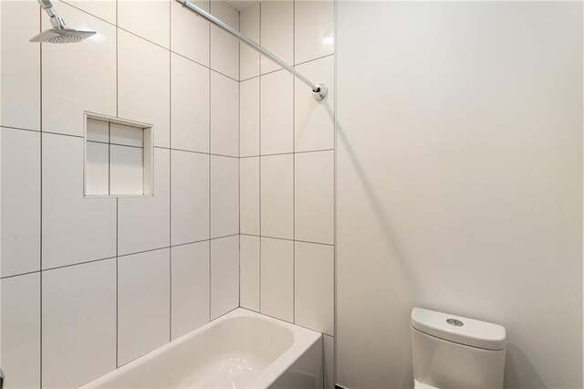 1045 Shepherds Ln NE, Atlanta, GA 30324 - bathroom featuring tub / shower combination and toilet