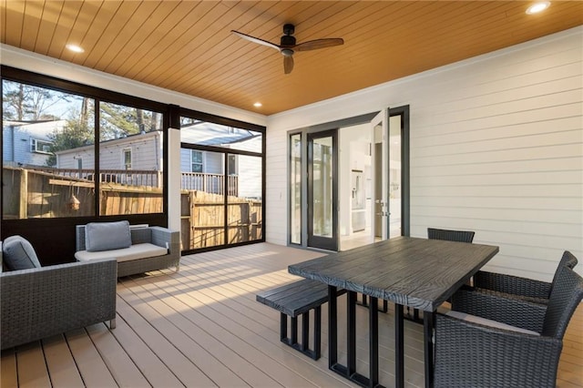 1045 Shepherds Ln NE, Atlanta, GA 30324 - sunroom featuring outdoor dining area and ceiling fan