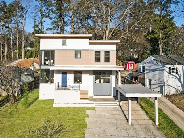 1045 Shepherds Ln NE, Atlanta, GA 30324 - back of house with driveway and a yard