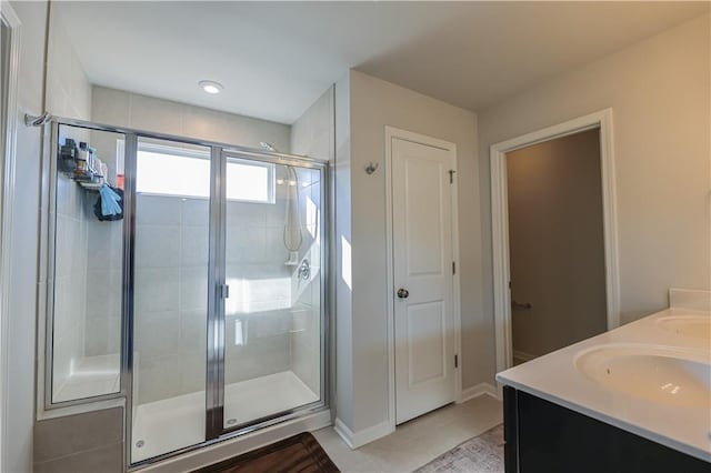 3172 Lowell Rd, Bethlehem, GA 30620 - full bath featuring a stall shower, double vanity, and tile patterned flooring