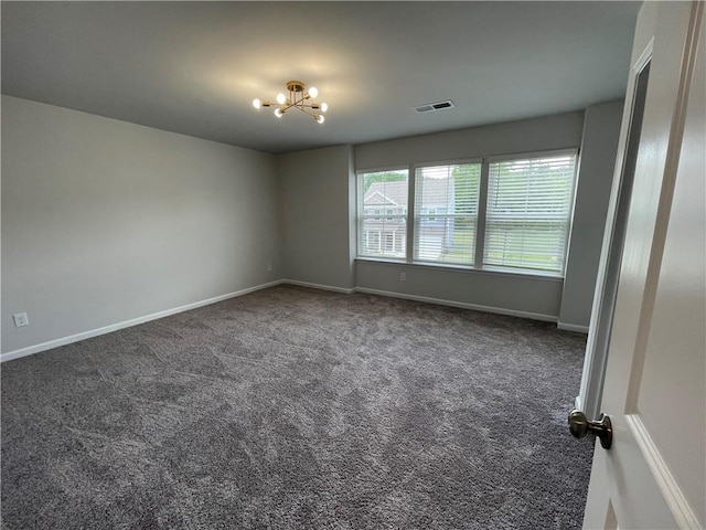 3172 Lowell Rd, Bethlehem, GA 30620 - carpeted empty room featuring a chandelier and baseboards