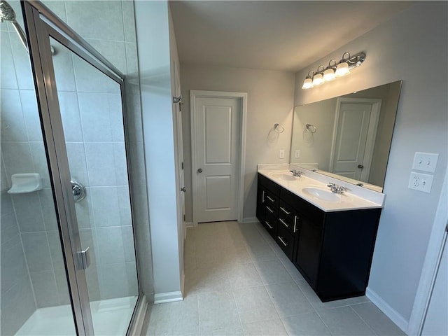 3172 Lowell Rd, Bethlehem, GA 30620 - full bathroom with tile patterned floors, double vanity, and a stall shower