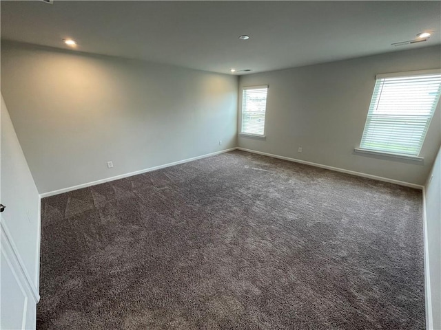 3172 Lowell Rd, Bethlehem, GA 30620 - spare room with dark colored carpet and recessed lighting